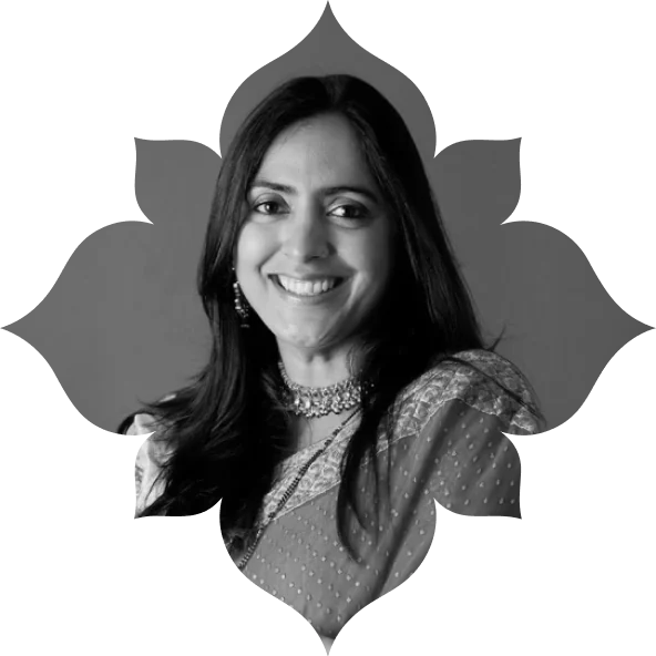 Priya, smiling